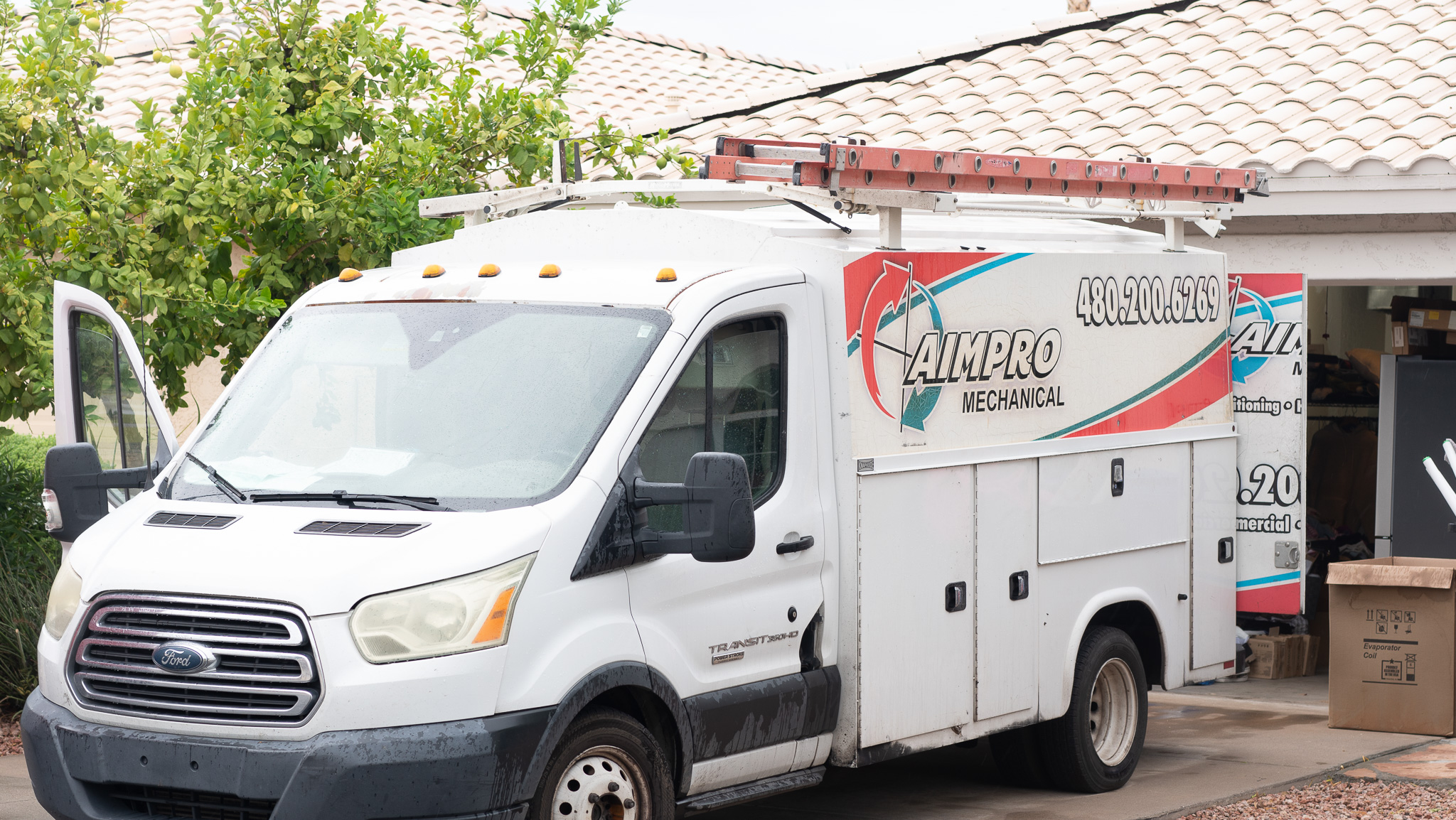 AimPro Air service van on a residential service call